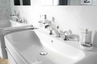 Смеситель для раковины на три отверстия Kludi 1926 хром 5104305G5